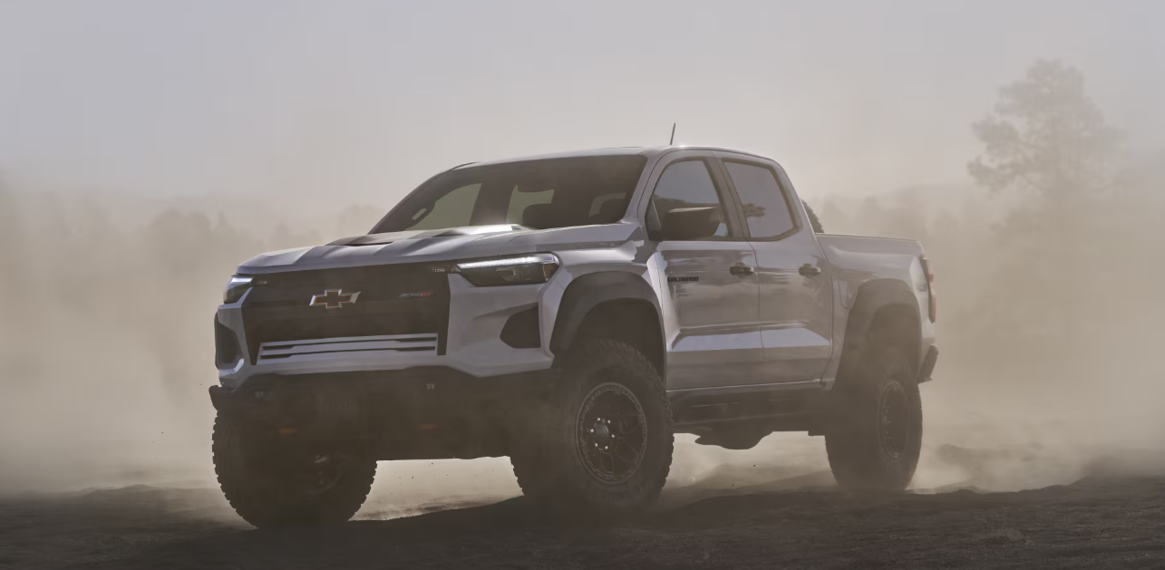 A Silverado ZR2 Bison off roading in jungle rear view